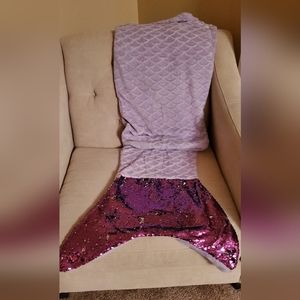 Mermaid tail blanket in purple.
